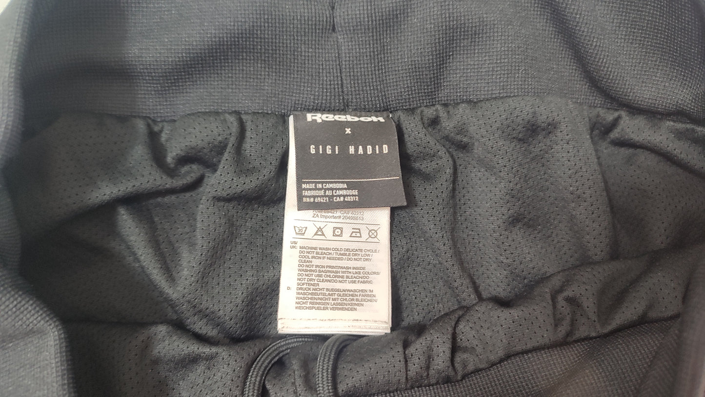 Vêtement Femme pantalon survêtement Reebok Gigi Hadid noir et orange taille XS  #RETROSTREET